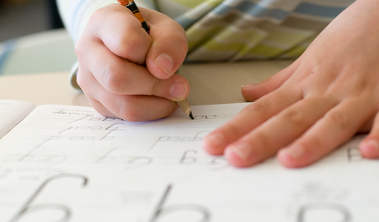 Student practicing writing